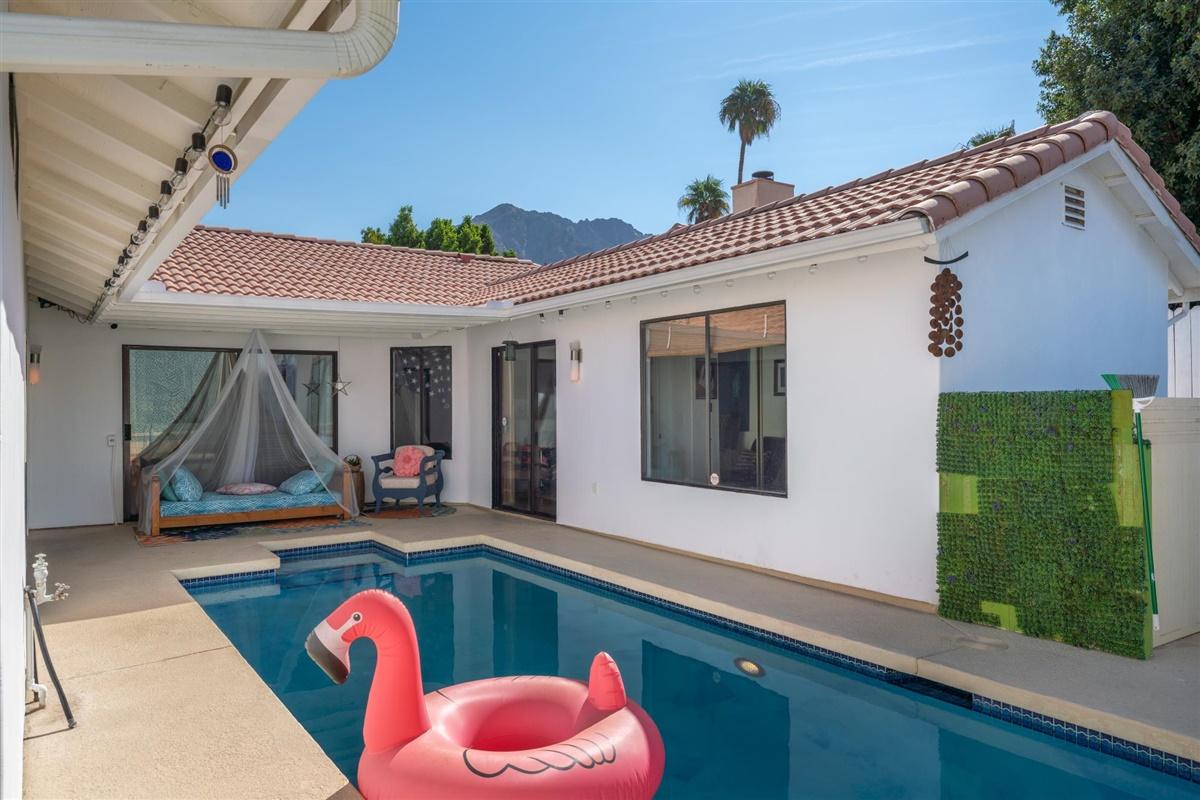 52695 Avenida Bermudas La Quinta, CA 92253 - Photo 19 of 49 a front view of a house with deck