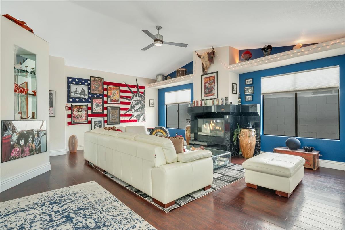 52695 Avenida Bermudas La Quinta, CA 92253 - Photo 22 of 49 a living room with furniture fireplace and wooden floor