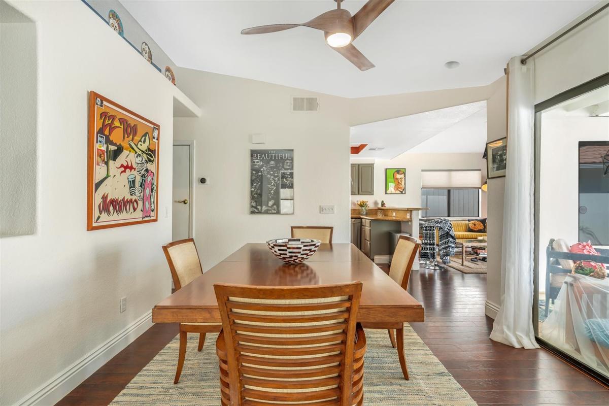52695 Avenida Bermudas La Quinta, CA 92253 - Photo 27 of 49 a dining room with furniture and wooden floor