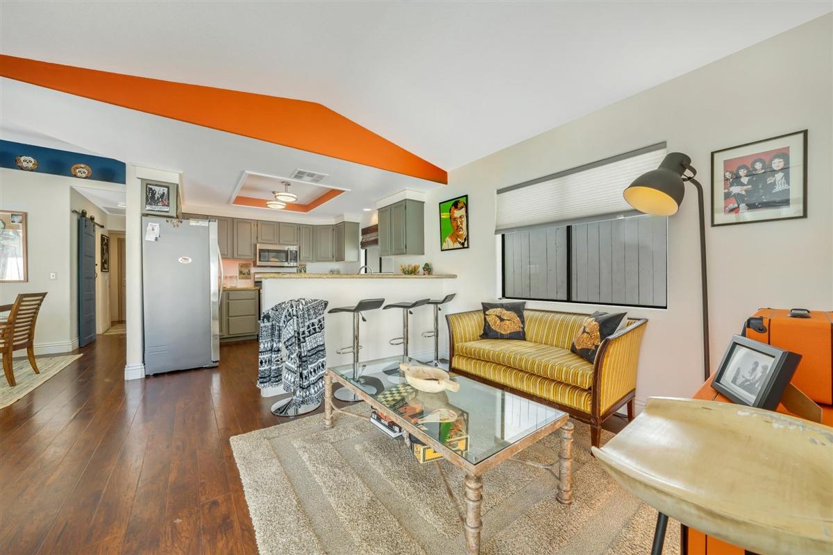 52695 Avenida Bermudas La Quinta, CA 92253 - Photo 34 of 49 a living room with furniture and a wooden floor