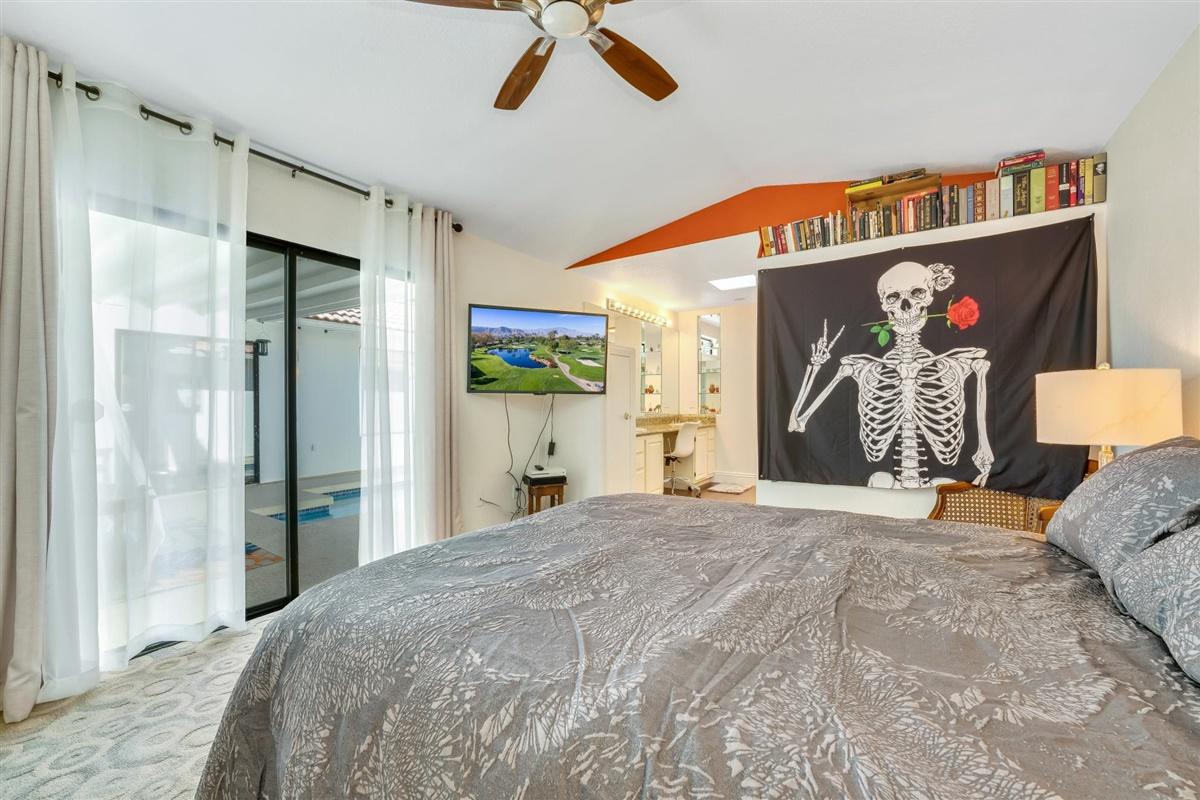 52695 Avenida Bermudas La Quinta, CA 92253 - Photo 40 of 49 a bedroom with a bed and a window