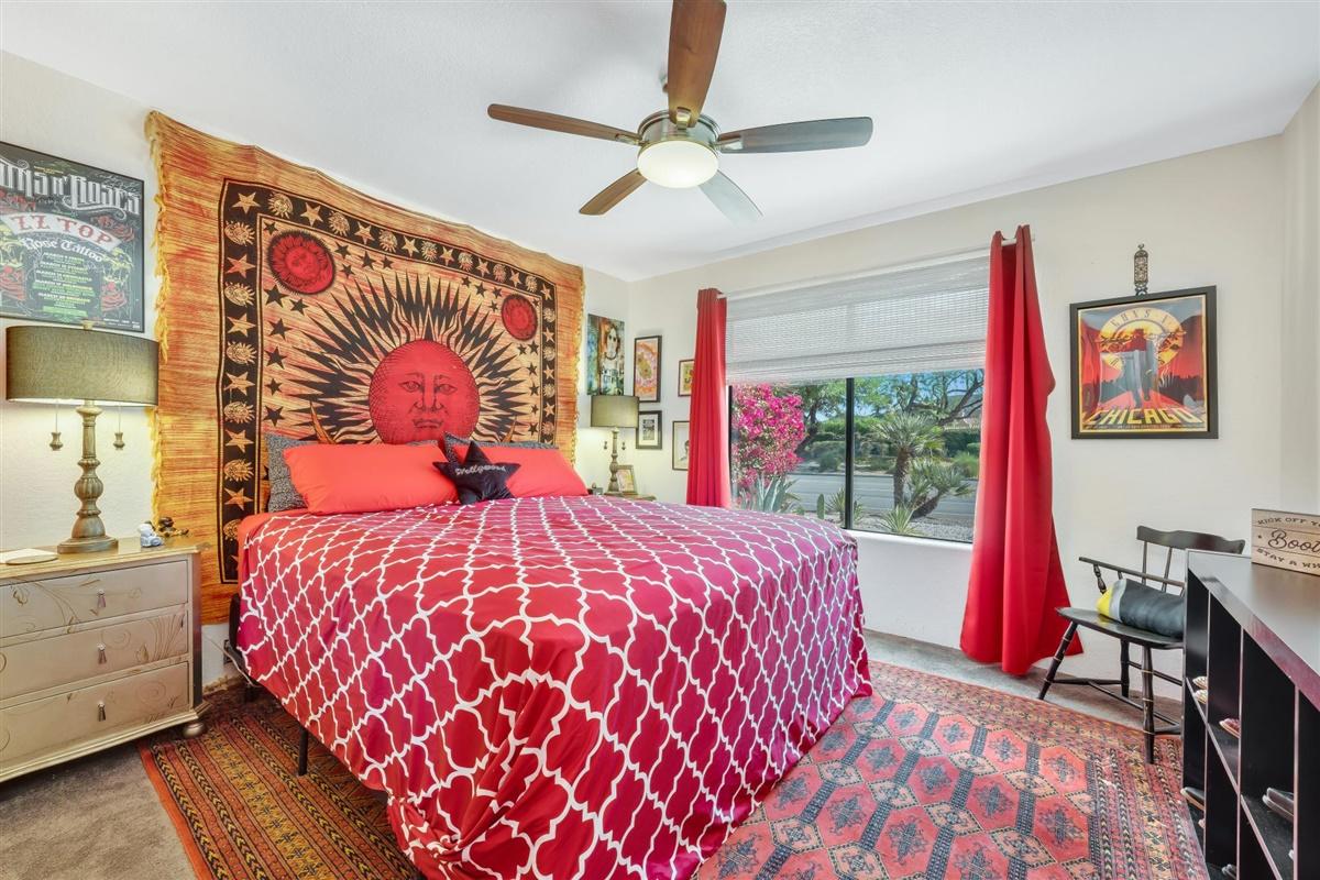 52695 Avenida Bermudas La Quinta, CA 92253 - Photo 43 of 49 a bedroom with a large bed and a window