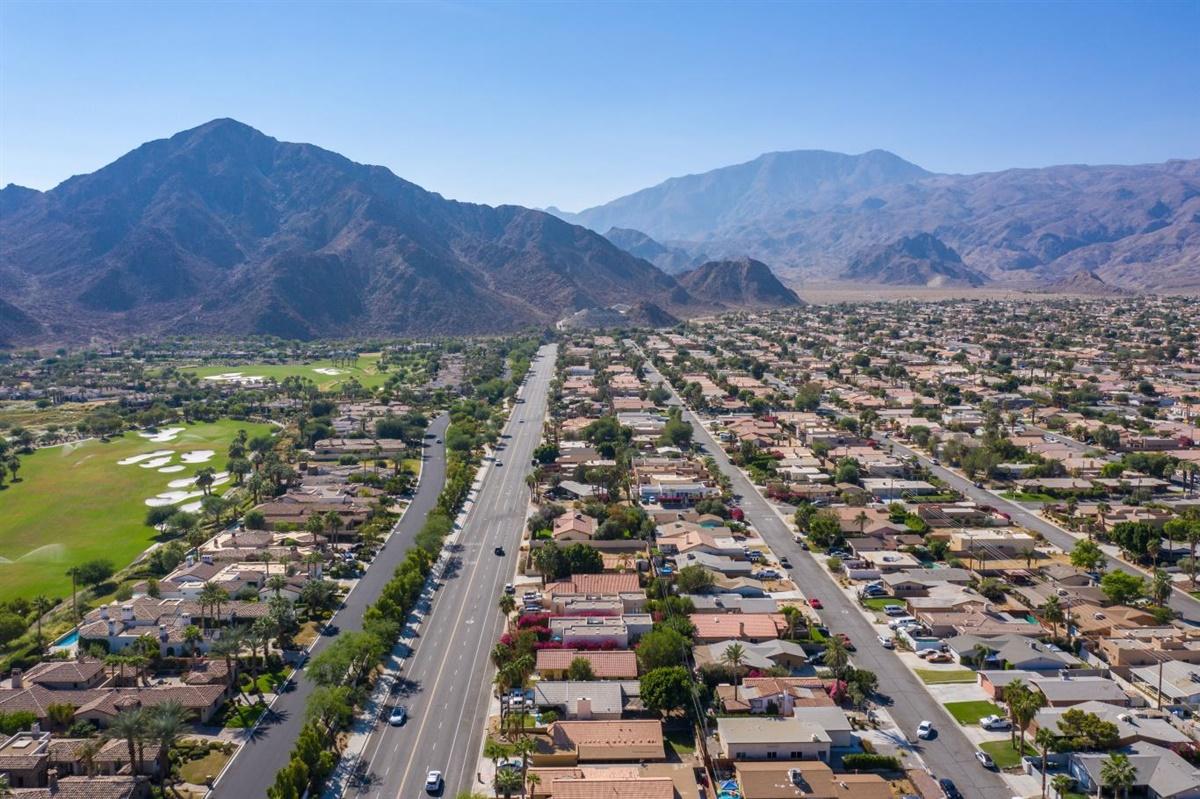 52695 Avenida Bermudas La Quinta, CA 92253 - Photo 8 of 49 an aerial view of residential house and sandy dunes