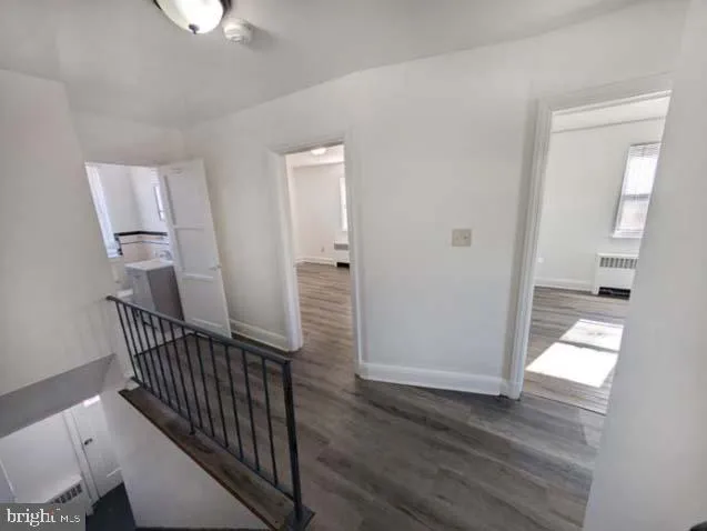 an entryway with a workspace