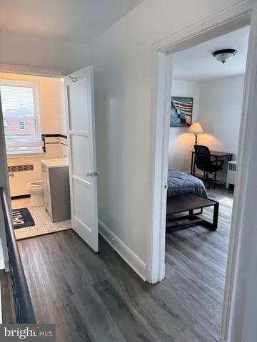 a view of living room with furniture and a window