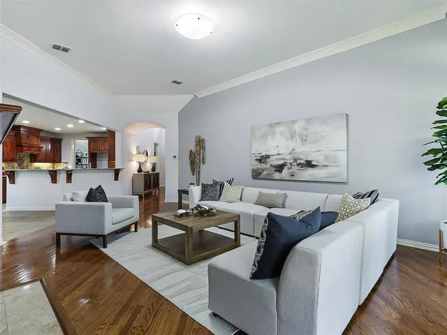 a living room with furniture and a couch