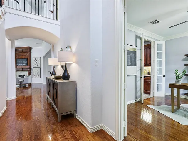 a view of living room and wooden floor