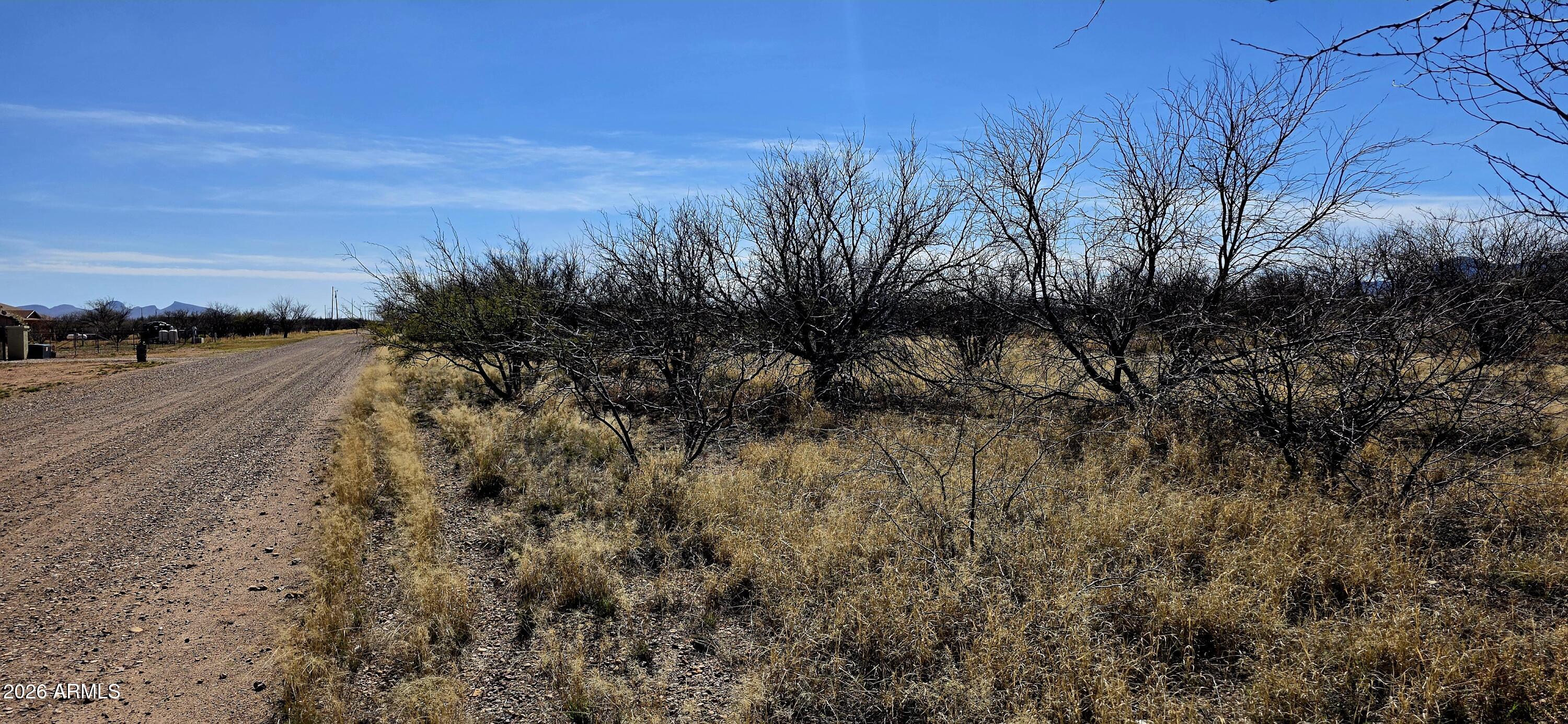 8254 South Airstrip Road, Unit 14 Hereford, AZ 85615 - Photo 6 of 7 a view of an outdoor space and a yard