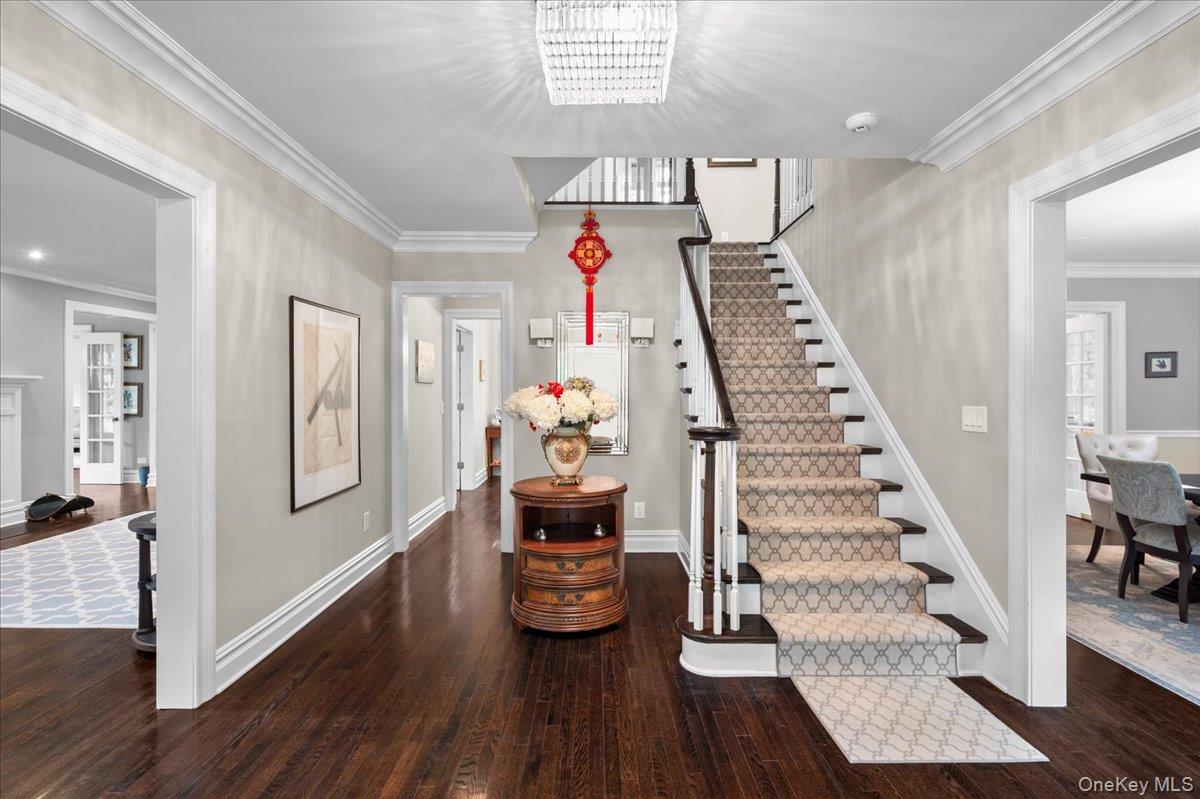 7 Harcourt Road Scarsdale, NY 10583 - Photo 9 of 34 a view of entryway and hall with wooden floor