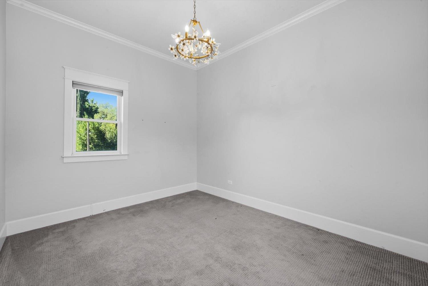 1121 4th Street Davis, CA 95616 - Photo 24 of 40 an empty room with a window