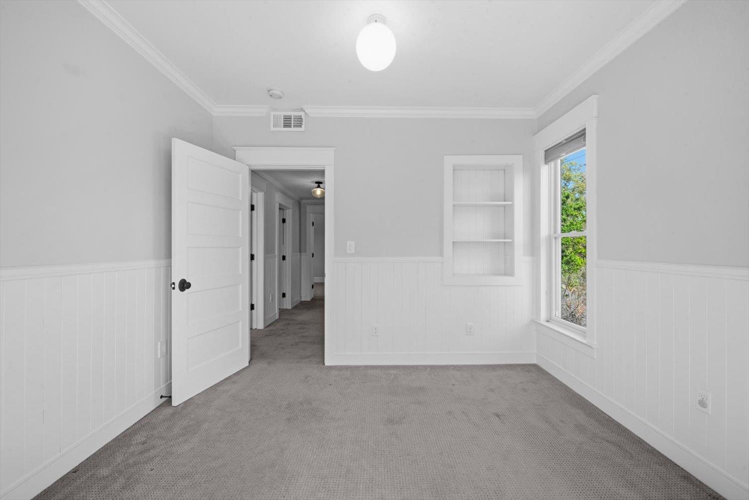 1121 4th Street Davis, CA 95616 - Photo 28 of 40 an empty room with windows and closet