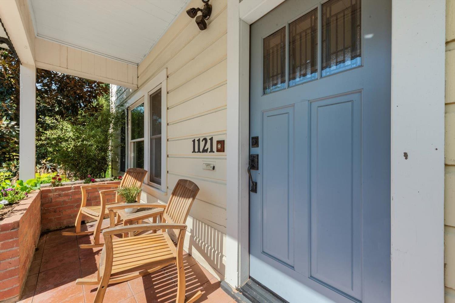 1121 4th Street Davis, CA 95616 - Photo 5 of 40 a view of a patio with a table and chairs