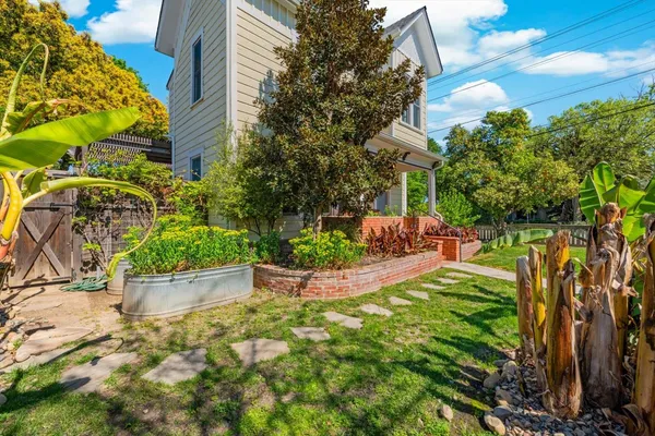 a view of yard with swimming pool