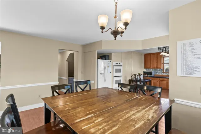 a view of a livingroom with furniture and a window