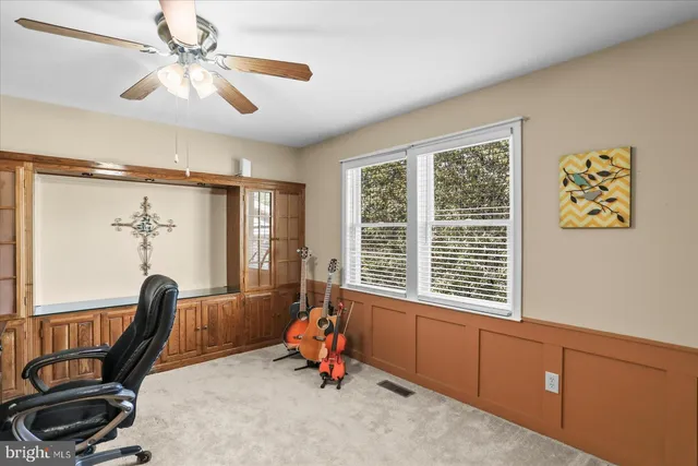 a room with a bed and furniture