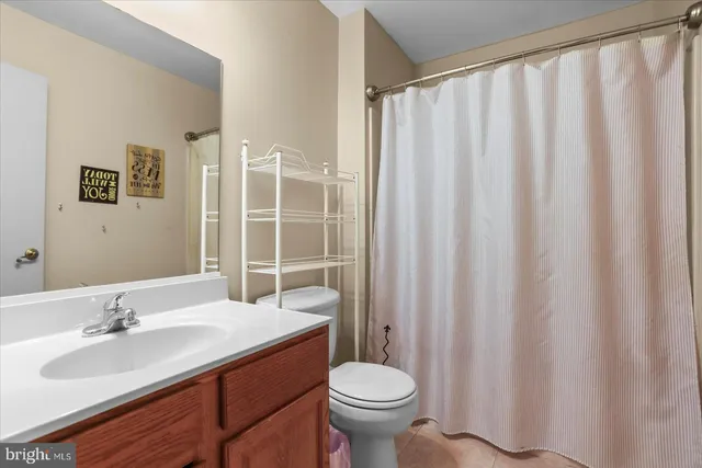 a house that has tree in front of it