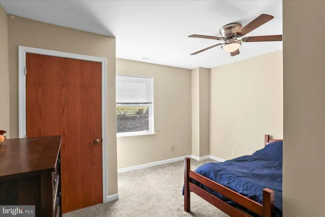 a view of a house with a yard and deck