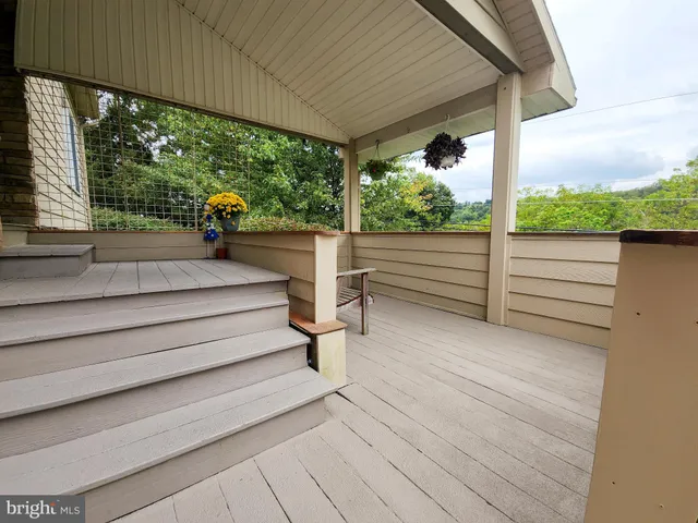 a view of outdoor space with seating green space and entrance