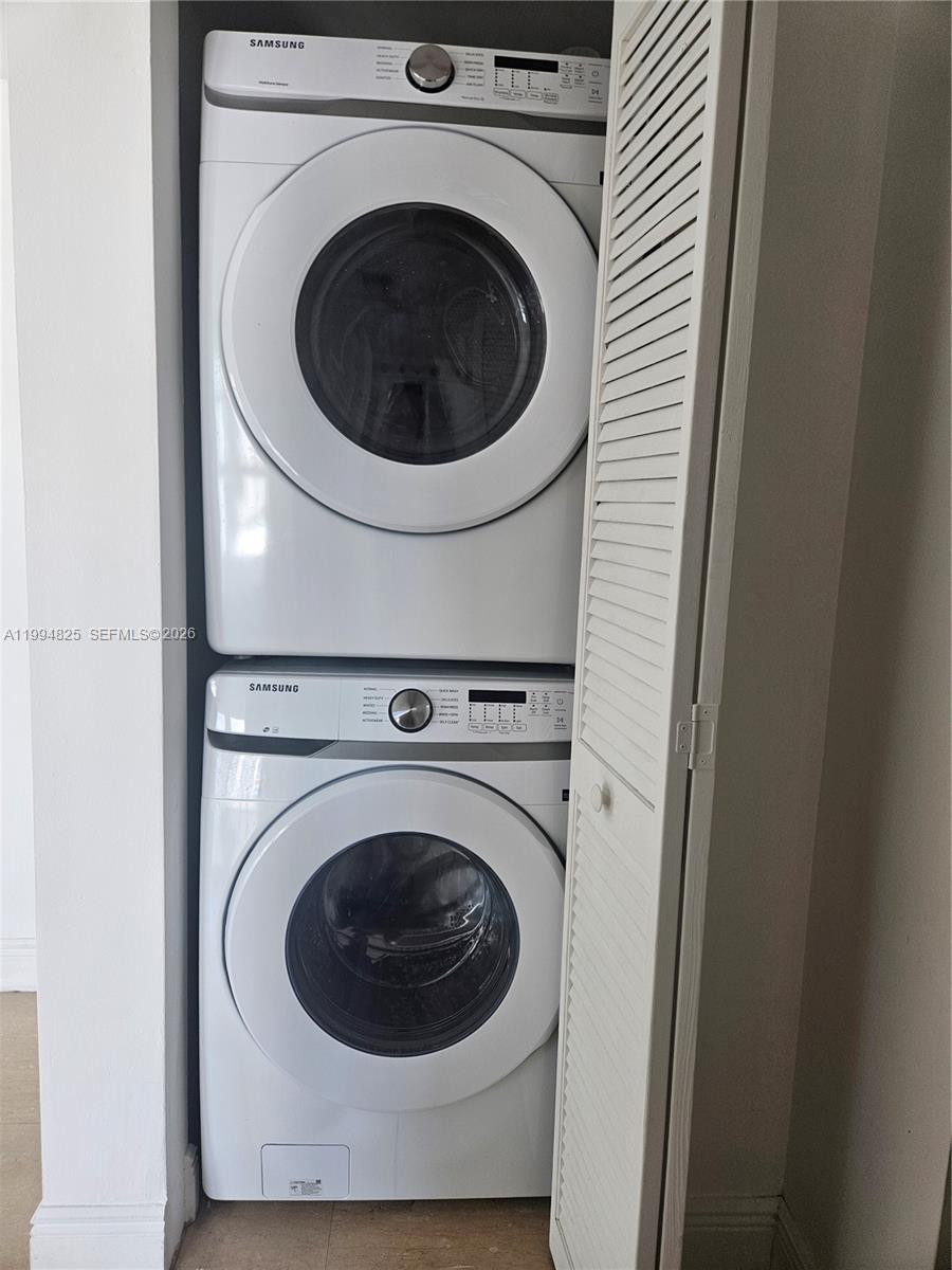 41 Southeast 5th Street, Unit 1517 Miami, FL 33131 - Photo 37 of 62 a close up view of a washer and dryer