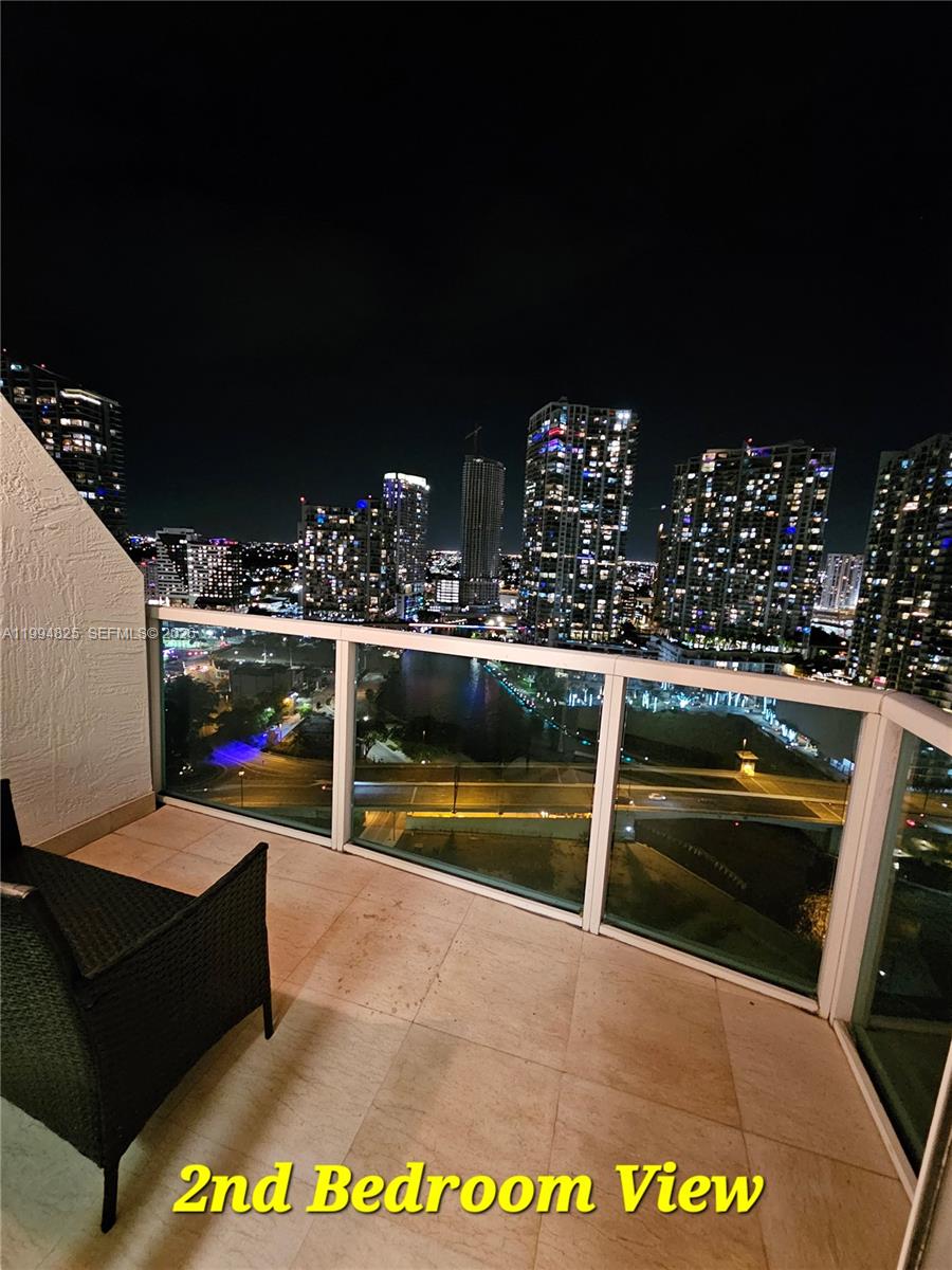 41 Southeast 5th Street, Unit 1517 Miami, FL 33131 - Photo 54 of 62 a view of swimming pool with seating space