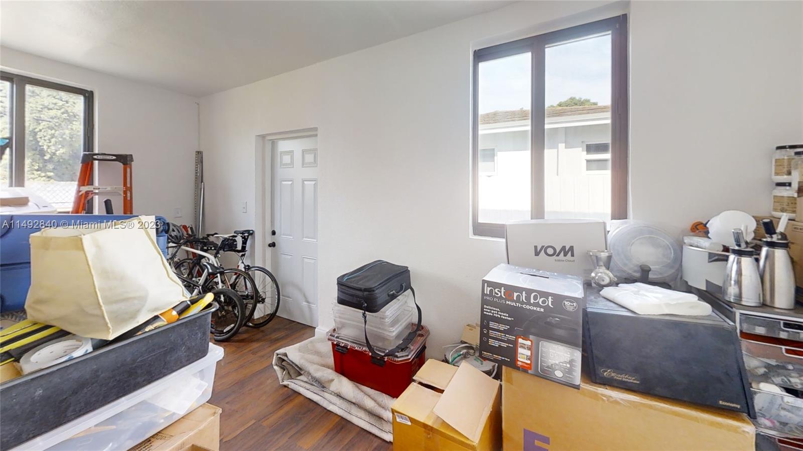 445 Southwest 62nd Court Miami, FL 33144 - Photo 47 of 49 a living room with furniture and a window