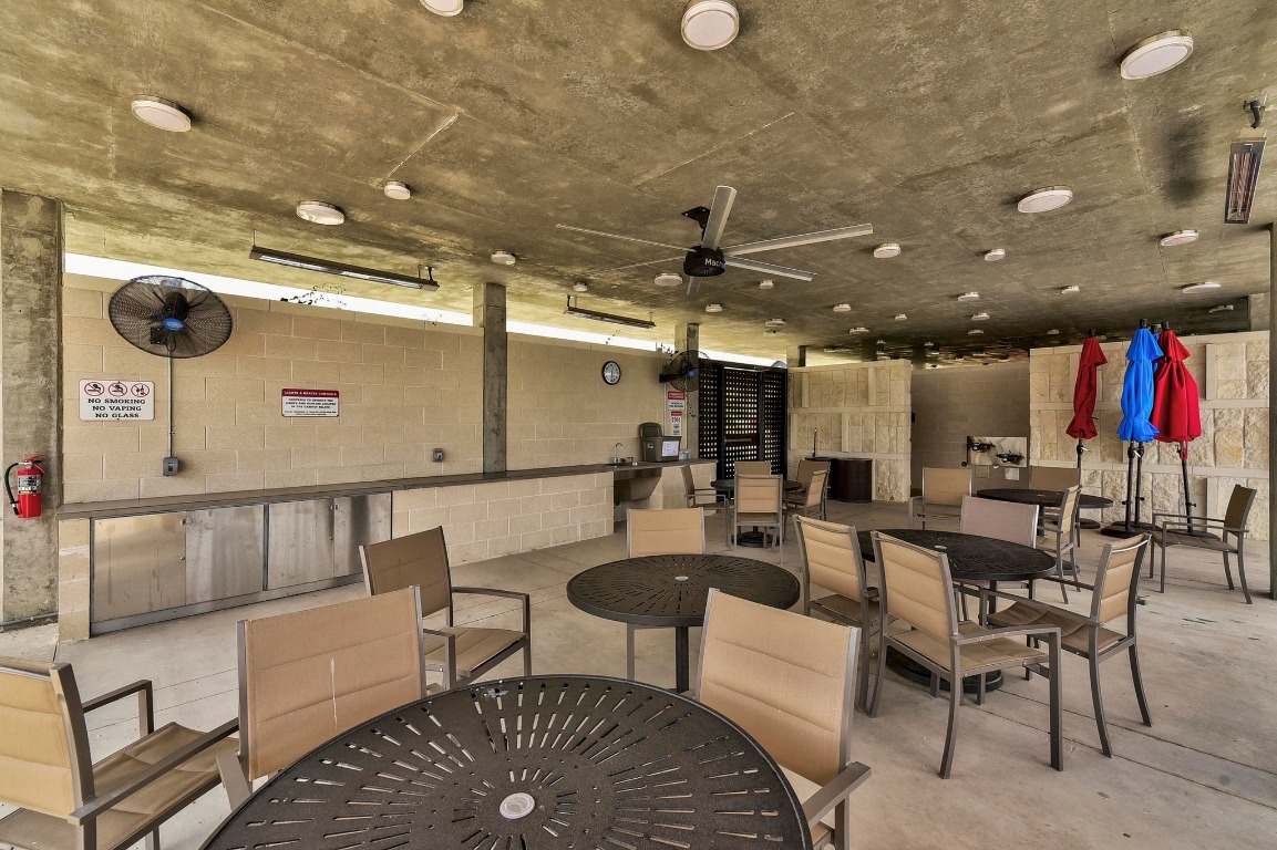 9015 Cattle Baron Path, Unit 2005 Austin, TX 78747 - Photo 27 of 37 a outdoor space with lots of tables and chairs