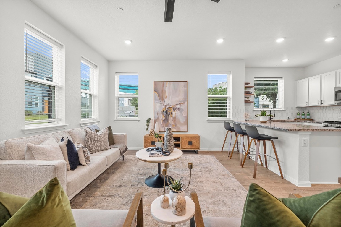 9015 Cattle Baron Path, Unit 2005 Austin, TX 78747 - Photo 6 of 37 a living room with furniture and a large window