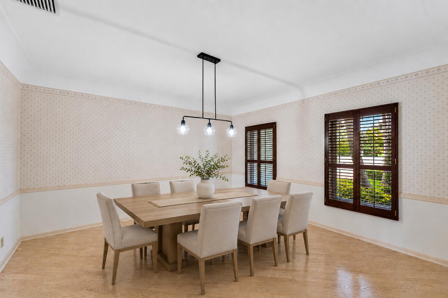 1851 Thatch Palm Drive Boca Raton, FL 33432 - Photo 22 of 70 a dining room with furniture and window
