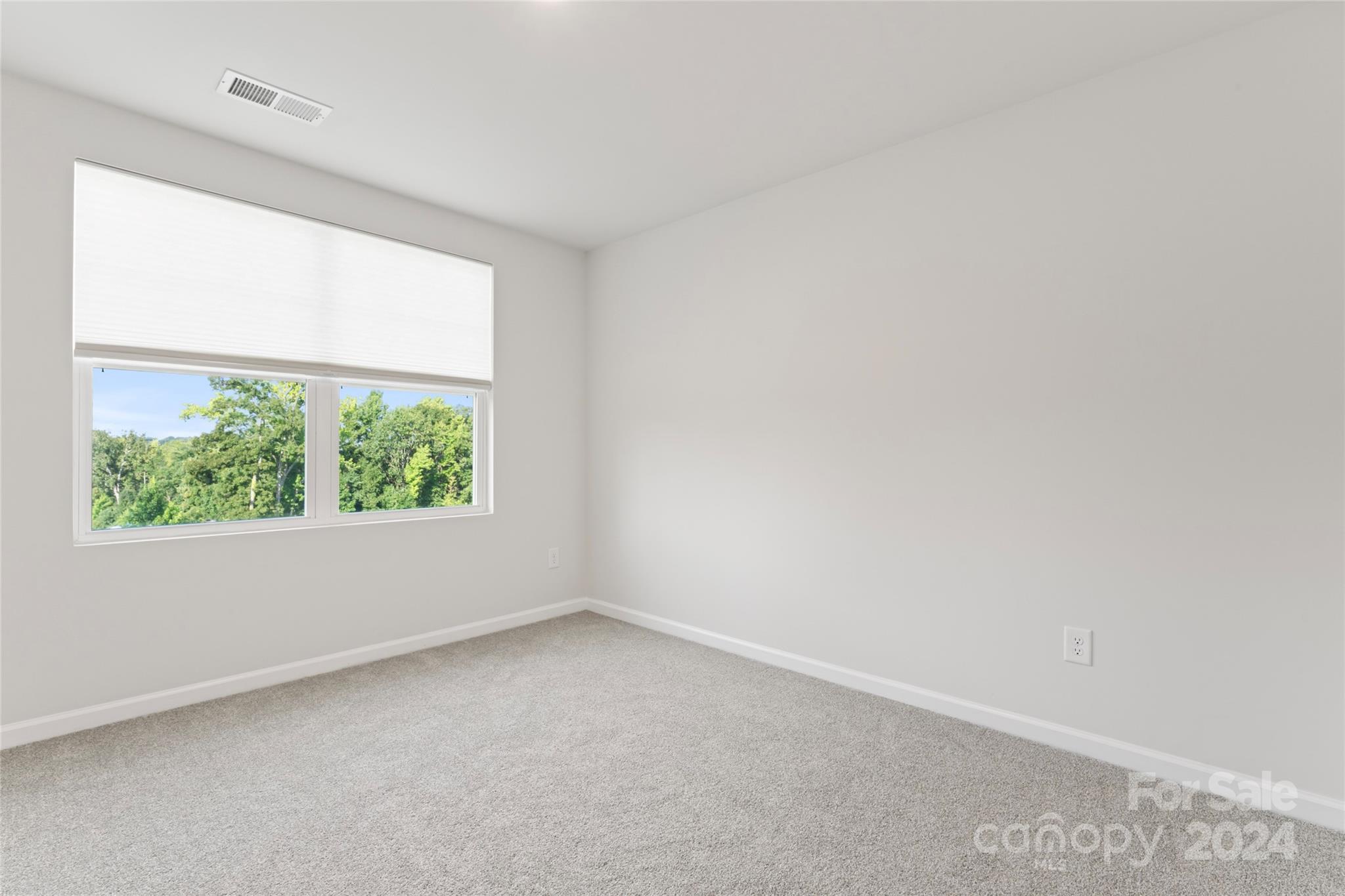 1655 Corwin Bend Road Tega Cay, SC 29708 - Photo 25 of 41 an empty room with a window