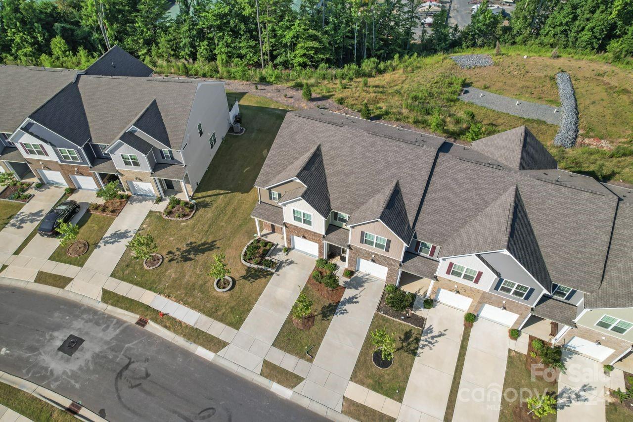 1655 Corwin Bend Road Tega Cay, SC 29708 - Photo 6 of 41 an aerial view of a residential houses with yard