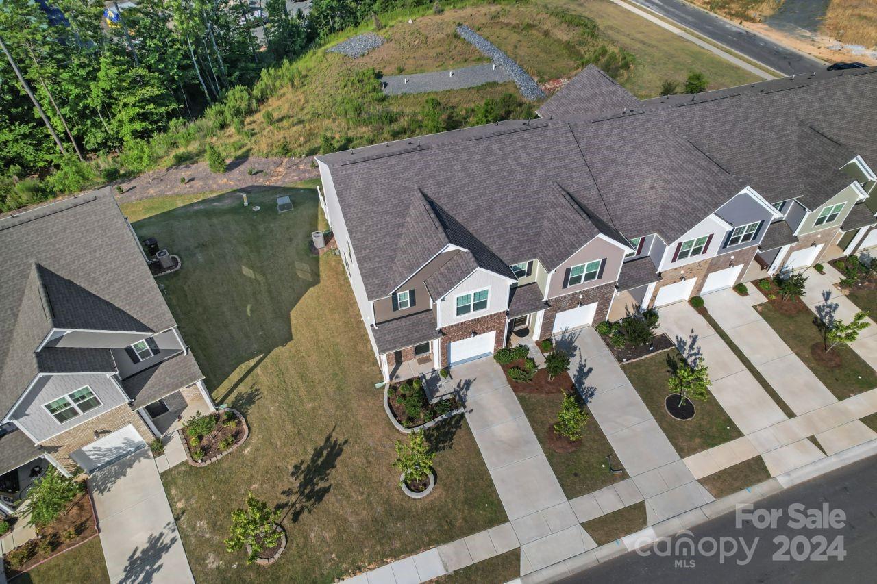 1655 Corwin Bend Road Tega Cay, SC 29708 - Photo 7 of 41 an aerial view of a house with a yard