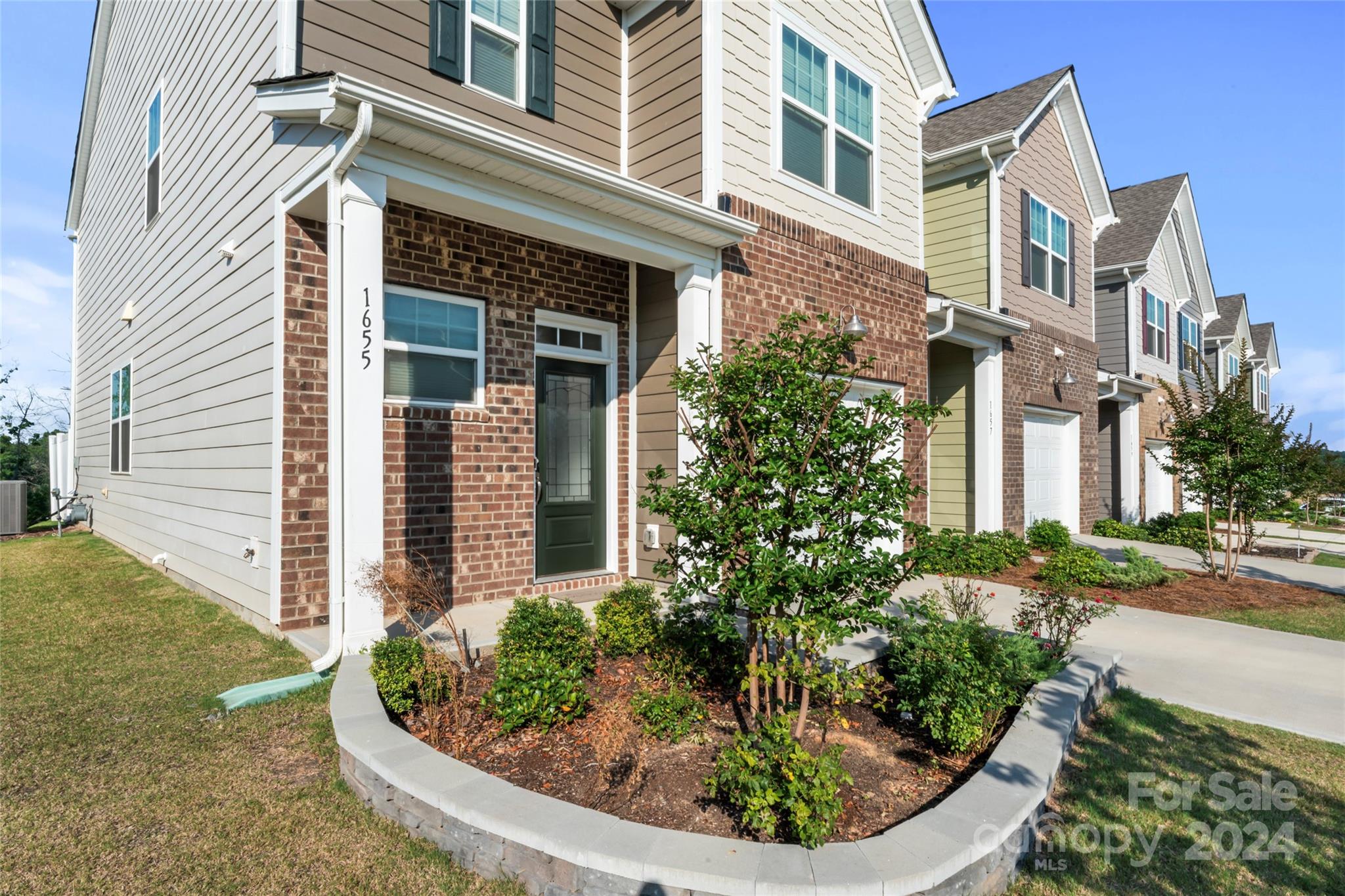 1655 Corwin Bend Road Tega Cay, SC 29708 - Photo 10 of 41 front view of a house
