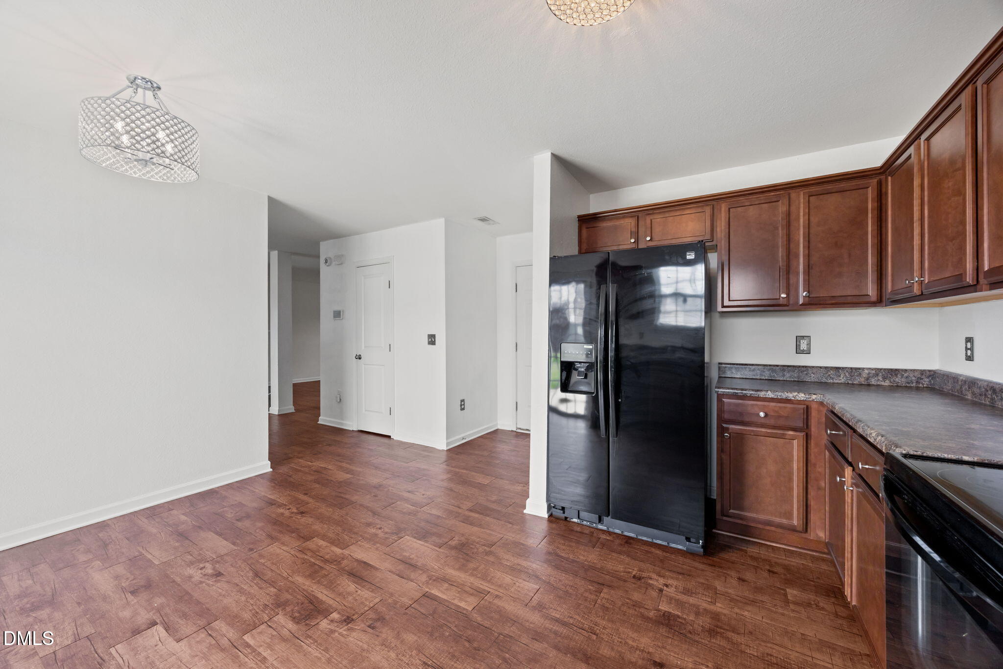 239 Battery Way Bunnlevel, NC 28323 - Photo 11 of 47 a kitchen with a refrigerator and a stove top oven