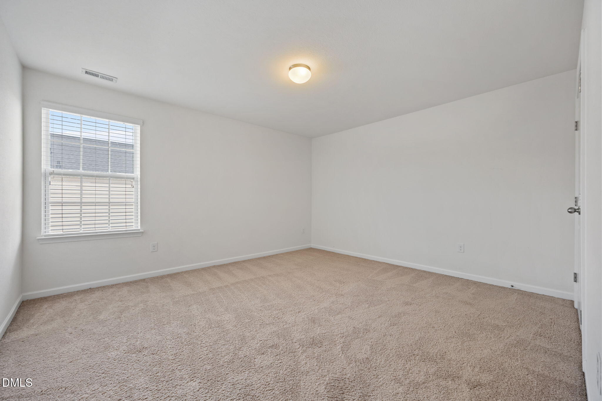 239 Battery Way Bunnlevel, NC 28323 - Photo 26 of 47 an empty room with a window