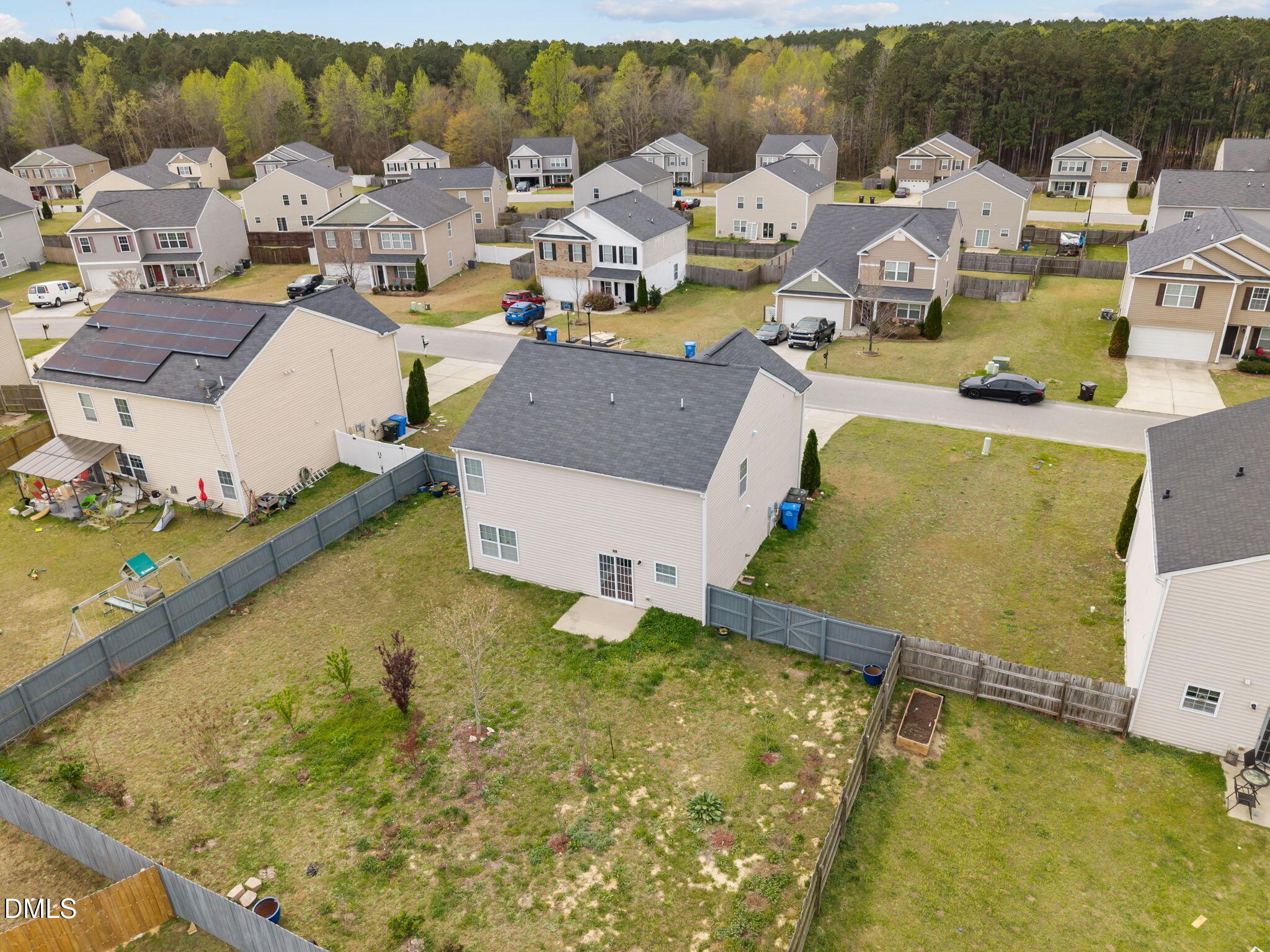 239 Battery Way Bunnlevel, NC 28323 - Photo 43 of 47 an aerial view of a house with a swimming pool
