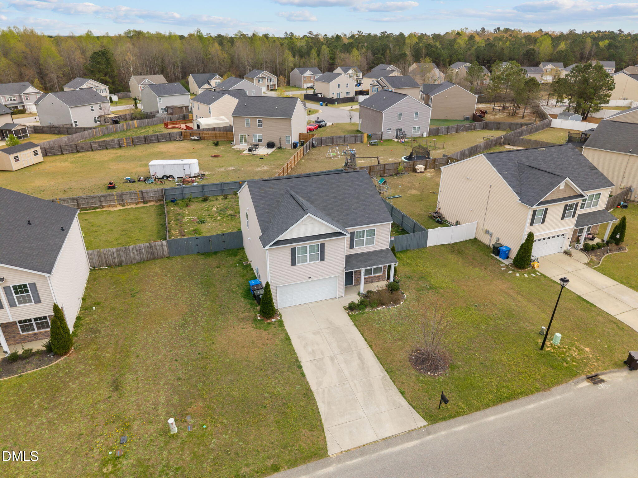 239 Battery Way Bunnlevel, NC 28323 - Photo 44 of 47 an aerial view of a house with a garden
