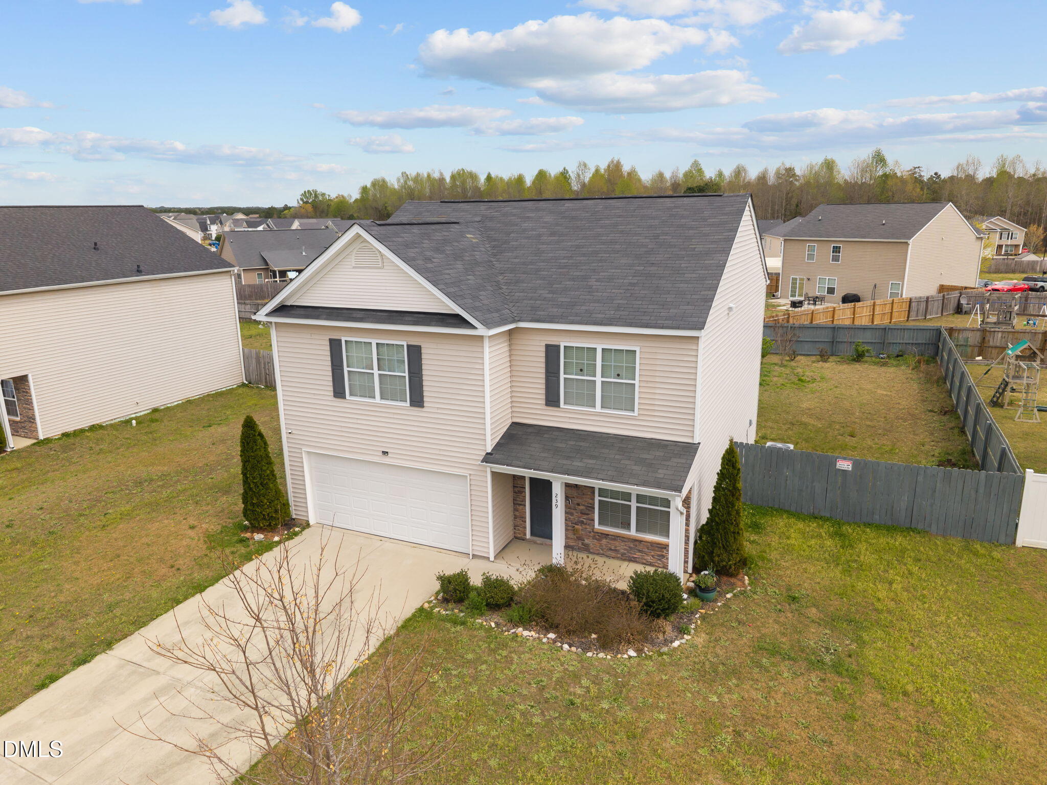 239 Battery Way Bunnlevel, NC 28323 - Photo 46 of 47 a front view of a house with a yard