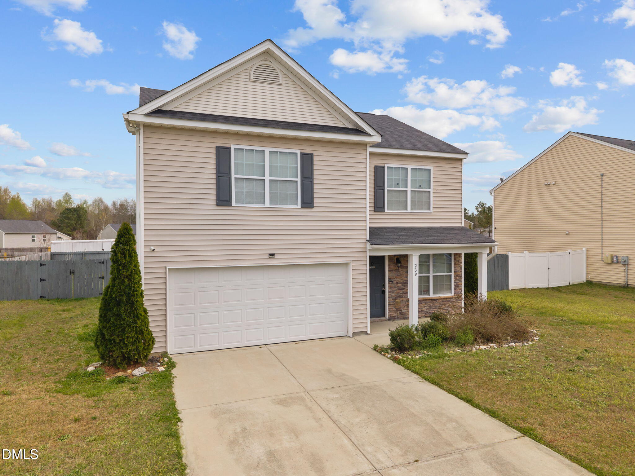 239 Battery Way Bunnlevel, NC 28323 - Photo 47 of 47 a front view of a house with garden