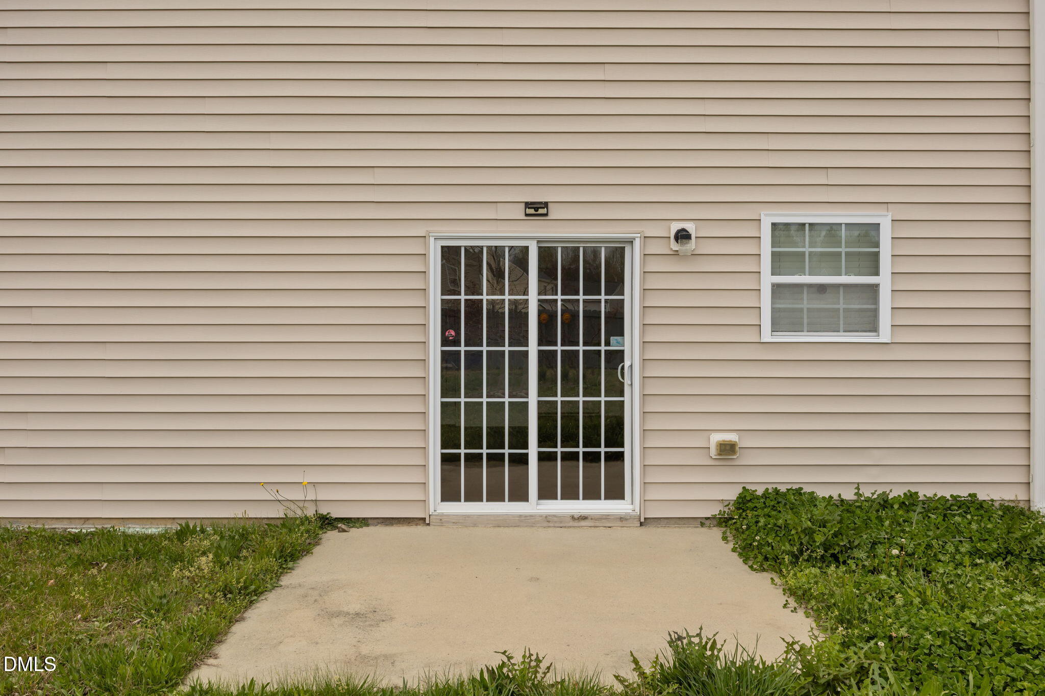 239 Battery Way Bunnlevel, NC 28323 - Photo 5 of 47 a front view of a house with a yard and garage
