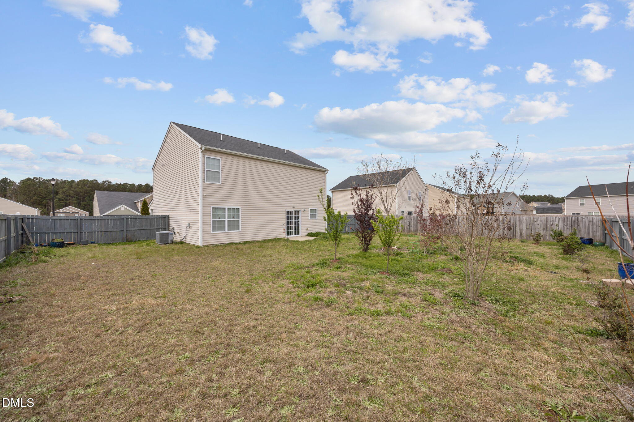 239 Battery Way Bunnlevel, NC 28323 - Photo 7 of 47 a view of a house with a yard