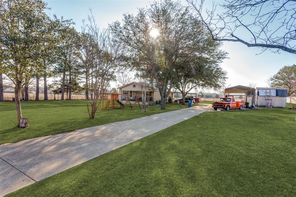 a view of a park with tree s