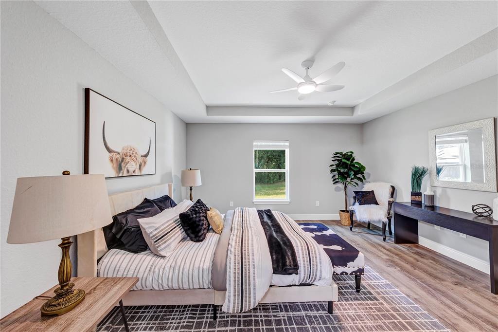 7217 Hemlock Loop Ocala, FL 34472 - Photo 12 of 27 a bedroom with furniture and a window