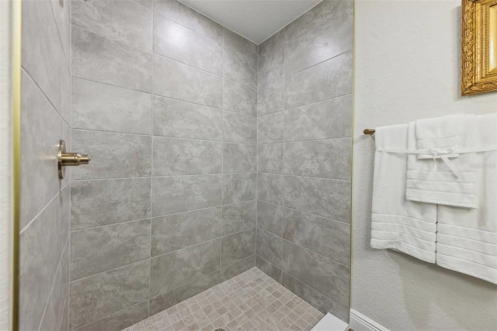 7217 Hemlock Loop Ocala, FL 34472 - Photo 15 of 27 a bathroom with a shower