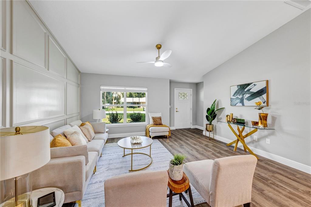 7217 Hemlock Loop Ocala, FL 34472 - Photo 35 of 36 a living room with furniture and a table