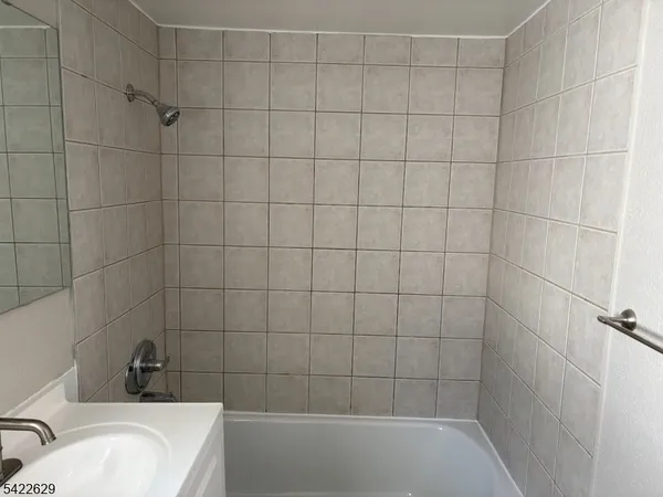 a bathroom with a sink and bathtub