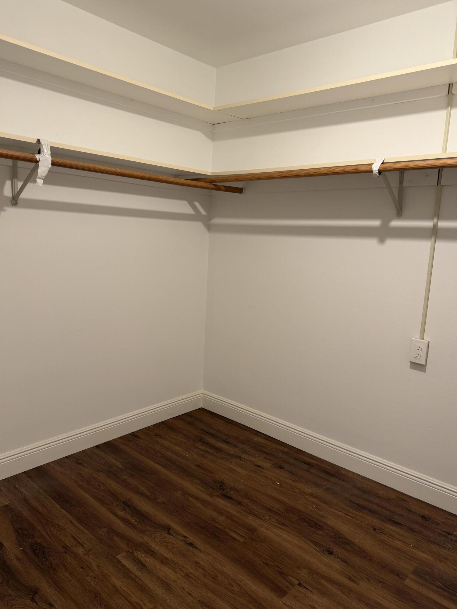 340 Orange Tree Drive, Unit 1 Atlantis, FL 33462 - Photo 17 of 23 a view of a room with wooden floor