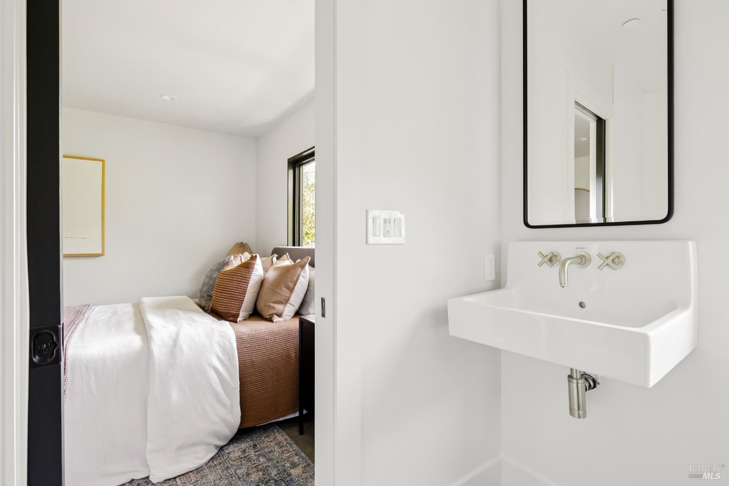 56 Millard Road Larkspur, CA 94939 - Photo 50 of 74 a bedroom with a bed and a sink