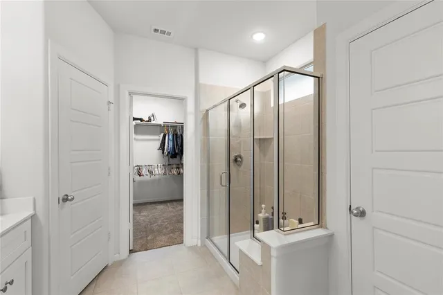 a view of a bathroom with shower
