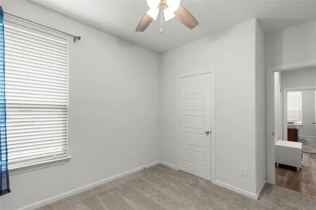 an empty room with a bathroom