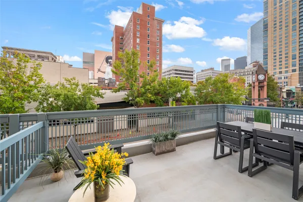 a view of a terrace with chairs